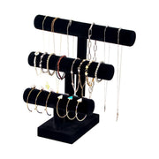 Gold & Black Bracelet on Black Stand
