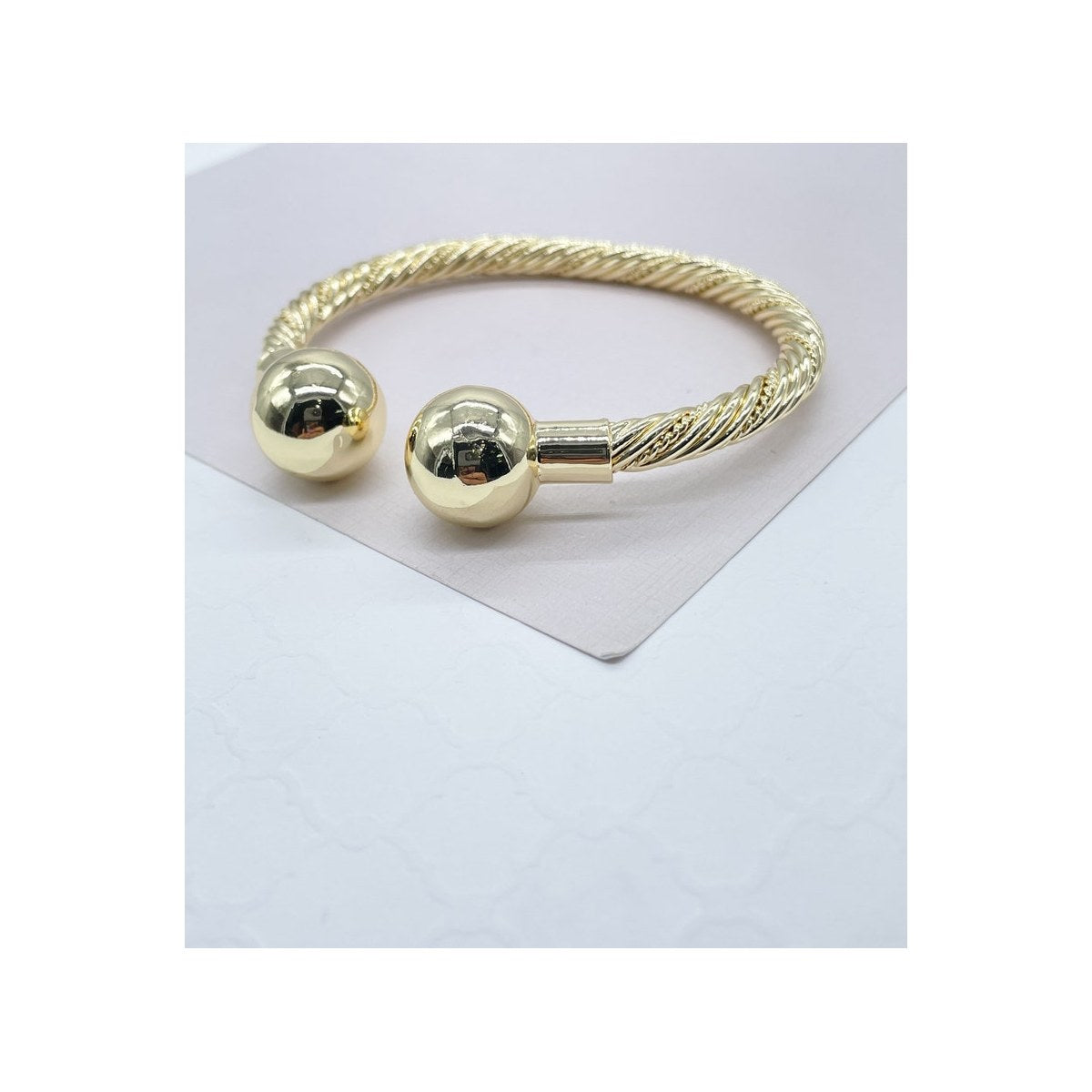 Gold Twisted Opening Two Ball Bangle